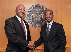 John Rhea, NYCHA Chairman (rt) with Cecil House new General Manager. Photo by Leticia Barboza