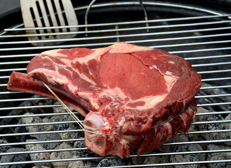 Photograph of meat on grill