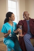 Nurse giving a patient a checkup