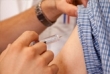 Man receiving vaccine