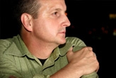 Middle-aged man thinking