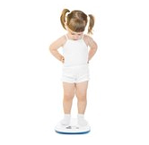 Overweight girl standing on scale