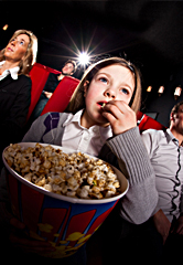 Teenage girl at movie theater.