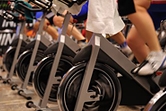 People biking at the gym