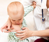 Young child gets a shot