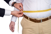 Man has his belly measured