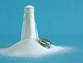 Salt pouring out of a shaker