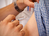Someone getting a flu shot