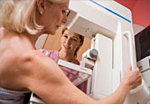Woman gets a breast cancer screening.