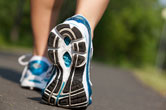 A look at a woman's shoe as she walks.