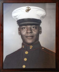Kenneth Chamberlain holds photo of his dad Kenneth Chamberlain. The Shooting death of Kenneth Chamberlain, a 68-year old former Marine and retired correction officer in his home in White Plains las November has received virtually no attention. Chamberlain who had chronic heart problems and wore a heart monitor was shot to death by police officers who had been dispathed to his home to check on him by the heart monitoring company when the heart monitor went off accidentally.
