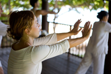 Photo of people in a tai chi class.